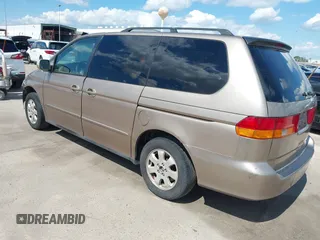 2003 Honda Odyssey EX-L z VIN 5FNRL18993B116892, wystawiony jako IAAI lot #42241908 z przebiegiem 276 223 mil mil oraz . Historia ofert i sprzedaży dostępna na DreamBid. Obrazek 3.