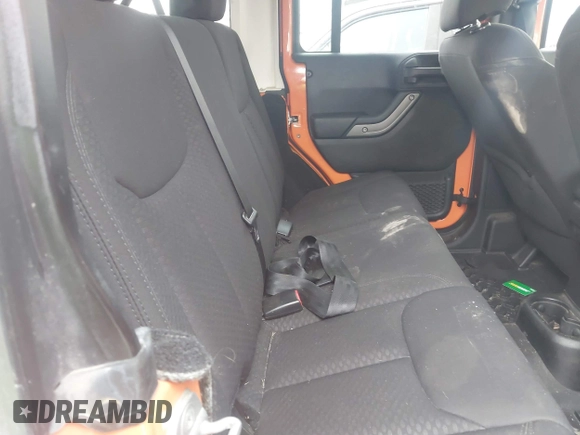 2013 Jeep Wrangler Unlimited Sport z VIN 1C4BJWDG7DL522421, wystawiony jako IAAI lot #41492425 z przebiegiem 55 921 mil mil oraz . Historia ofert i sprzedaży dostępna na DreamBid. Obrazek 8.