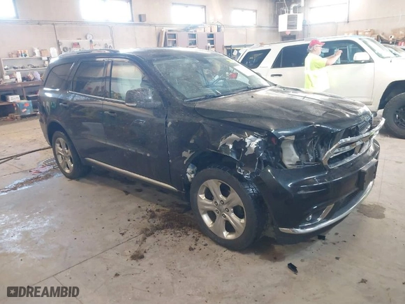 2014 Dodge Durango Limited with VIN 1C4RDJDG1EC973130, listed as a IAAI auction lot 41846596 with 166,182 mi miles. Bid and sale history available at carsss.com. Image 1.
