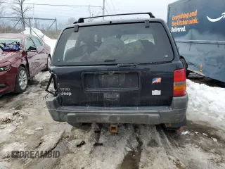 1998 Jeep Grand Cherokee Laredo with VIN 1J4GZ58SXWC293835, listed as a Copart auction lot 47557855 with 217,948 mi miles and Salvage Title. Bid and sale history available at carsss.com. Image 6.