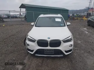 2018 BMW X1 xDrive28i with VIN WBXHT3C33J5L34824, listed as a IAAI auction lot 41977462 with 84,131 mi miles and . Bid and sale history available at DreamBid. Image 12.