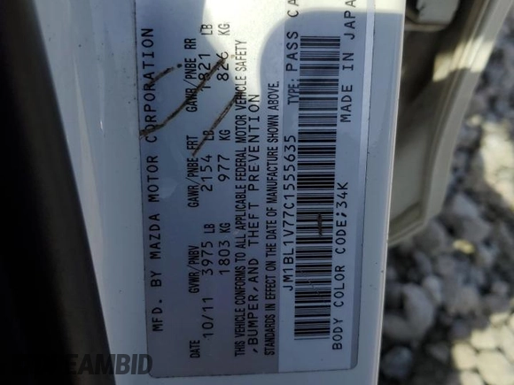 2012 Mazda 3 i Touring with VIN JM1BL1V77C1555635, listed as a Copart auction lot 51109795 with 284,602 mi miles and Salvage Title. Bid and sale history available at DreamBid. Image 12.