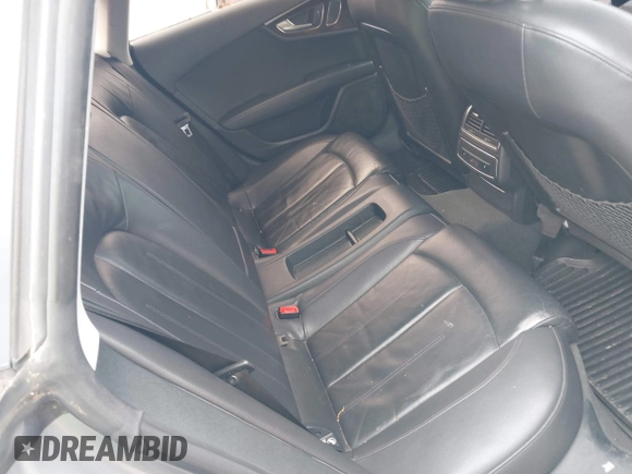 2013 Audi A7 Premium Plus with VIN WAUYGAFC1DN069906, listed as a IAAI auction lot 41906962 with 203,149 mi miles and . Bid and sale history available at DreamBid. Image 8.