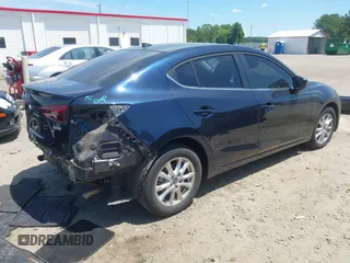 2015 Mazda 3 i Touring with VIN 3MZBM1V70FM228253, listed as a IAAI auction lot 42198130 with 61,236 mi miles and . Bid and sale history available at DreamBid. Image 4.