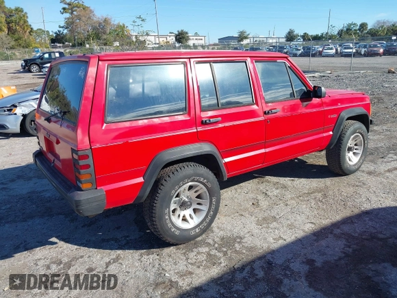 1996 Jeep Cherokee SE with VIN 1J4FT28S0TL225891, listed as a IAAI auction lot 41411705 with 233,983 mi miles and . Bid and sale history available at DreamBid. Image 4.