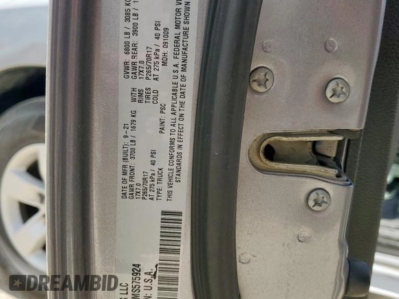 2021 Ram 1500 Tradesman with VIN 1C6RR6FGXMS575924, listed as a Copart auction lot 62588665 with 112,239 mi miles and Salvage title. Bid and sale history available at DreamBid. Image 12.