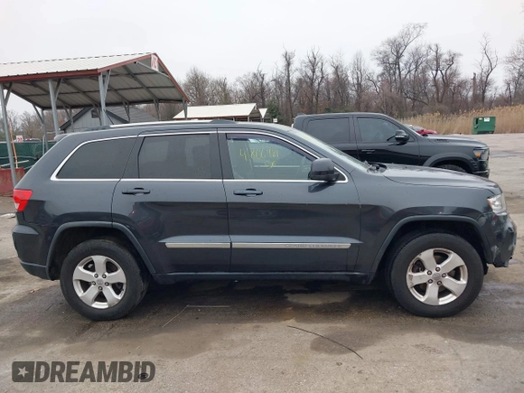 2013 Jeep Grand Cherokee Laredo with VIN 1C4RJFAG9DC506238, listed as a IAAI auction lot 41800981 with 172,676 mi miles. Bid and sale history available at carsss.com. Image 13.