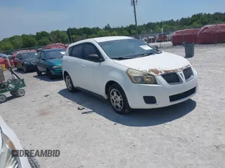 2010 Pontiac Vibe w/1SB with VIN 5Y2SP6E05AZ419359, listed as a IAAI auction lot 42069513 with 223,817 mi miles. Bid and sale history available at carsss.com. Image 1.