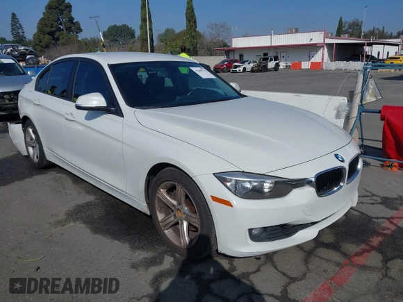 2014 BMW 3 Series 328i with VIN WBA3A5C52EJ463819, listed as a IAAI auction lot 41669717 with 111,112 mi miles. Bid and sale history available at carsss.com. Image 1.