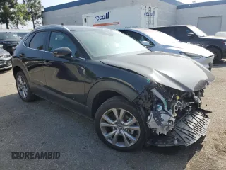 2023 Mazda CX-30 S Select with VIN 3MVDMBBM7PM582394, listed as a Copart auction lot 59786415 with Not provided miles and Salvage title. Bid and sale history available at DreamBid. Image 4.
