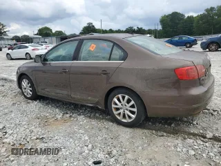 2014 Volkswagen Jetta TDI w/Premium/Nav с VIN 3VWLL7AJ8EM253721, выставлен на аукционе Copart как лот 61551515 с пробегом 155 745 миль миль и Чистый • Clean title. История ставок и продаж доступна на DreamBid. Изображение 2.