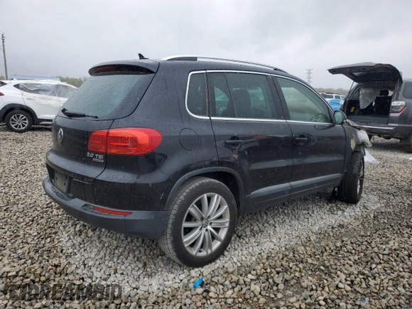2015 Volkswagen Tiguan SE z VIN WVGBV7AXXFW606017, wystawiony jako Copart lot #51005745 z przebiegiem Nie podano mil oraz Szkoda całkowita • Salvage title. Historia ofert i sprzedaży dostępna na DreamBid. Obrazek 3.