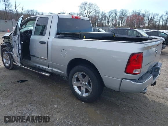 2014 Ram 1500 Express z VIN 1C6RR7FTXES136971, wystawiony jako IAAI lot #41845334 z przebiegiem 94 893 mil mil oraz . Historia ofert i sprzedaży dostępna na DreamBid. Obrazek 3.