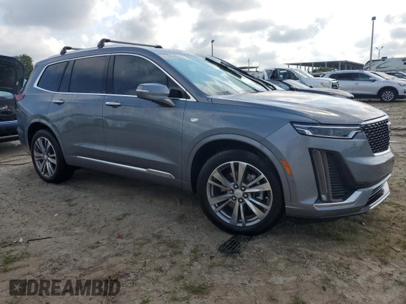 2021 Cadillac XT6 Premium Luxury with VIN 1GYKPCRS5MZ198953, listed as a Copart auction lot 67291154 with 0 mi miles and Salvage Title. Bid and sale history available at carsss.com. Image 4.