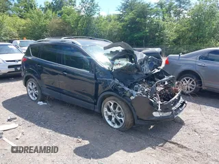 2015 Ford Escape Titanium z VIN 1FMCU0J99FUA73590, wystawiony jako IAAI lot #42152021 z przebiegiem Nie podano mil oraz . Historia ofert i sprzedaży dostępna na DreamBid. Obrazek 1.