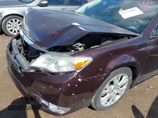 2011 Toyota Avalon with VIN 4T1BK3DB8BU416045, listed as a IAAI auction lot 41711885 with 153,910 mi miles and . Bid and sale history available at DreamBid. Image 6.