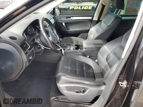 2016 Volkswagen Touareg Sport with VIN WVGEF9BP3GD007543, listed as a Copart auction lot 52806715 with 121,404 mi miles and Salvage Title. Bid and sale history available at DreamBid. Image 7.