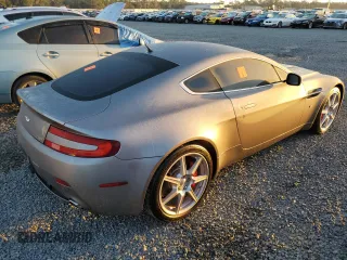 2006 Aston Martin Vantage z VIN SCFBB03B26GC01810, wystawiony jako Copart lot #75127204 z przebiegiem Nie podano mil oraz Nie do naprawy • Non repairable. Historia ofert i sprzedaży dostępna na DreamBid. Obrazek 3.