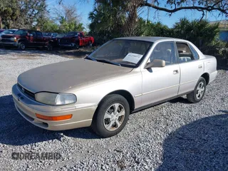 1994 Toyota Camry LE with VIN 4T1SK12E9RU351895, listed as a IAAI auction lot 41239573 with 184,866 mi miles. Bid and sale history available at carsss.com. Image 2.
