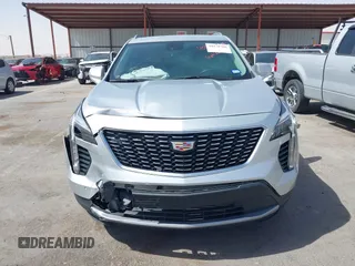 2021 Cadillac XT4 FWD Premium Luxury with VIN 1GYFZCR42MF005253, listed as a IAAI auction lot 40470700 with 70,571 mi miles and . Bid and sale history available at carsss.com. Image 12.