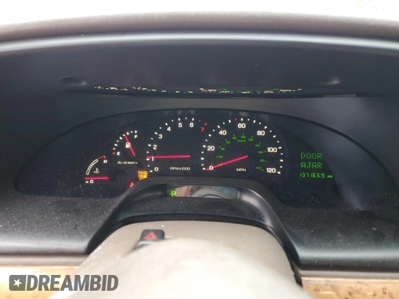 1999 Lincoln Continental with VIN 1LNHM97V3XY667567, listed as a Copart auction lot 84194854 with 137,163 mi miles and Salvage Title. Bid and sale history available at carsss.com. Image 9.