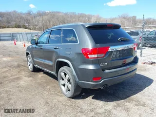 2011 Jeep Grand Cherokee Laredo with VIN 1J4RR4GT0BC543283, listed as a IAAI auction lot 41890109 with 123,325 mi miles. Bid and sale history available at carsss.com. Image 3.
