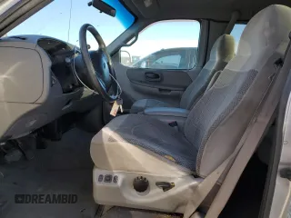 1999 Ford F-150 XL с VIN 1FTRX08L3XKA96271, выставлен на аукционе Copart как лот 49238415 с пробегом 168 477 миль миль и Списание • Salvage title. История ставок и продаж доступна на DreamBid. Изображение 7.
