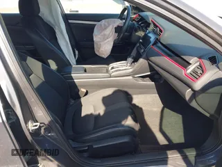 2019 Honda Civic Sport with VIN 2HGFC2F8XKH598141, listed as a IAAI auction lot 42013724 with 98,401 mi miles and . Bid and sale history available at DreamBid. Image 5.