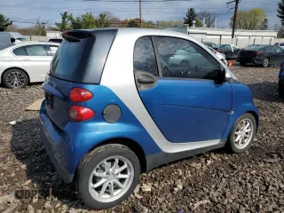 2008 Smart fortwo Pure z VIN WMEEJ31X08K095175, wystawiony jako Copart lot #52931165 z przebiegiem 102 299 mil mil oraz Szkody całkowita. Historia ofert i sprzedaży dostępna na DreamBid. Obrazek 3.