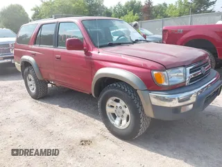 2000 Toyota 4Runner SR5 with VIN JT3HN86R9Y0322225, listed as a IAAI auction lot 42728069 with 216,000 mi miles and . Bid and sale history available at DreamBid. Image 1.