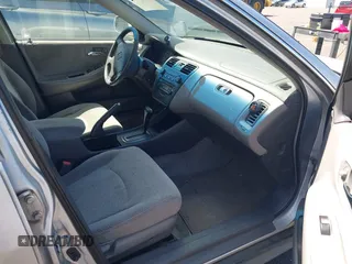 2002 Honda Accord LX with VIN 1HGCG56422A167829, listed as a IAAI auction lot 42401497 with 221,550 mi miles and . Bid and sale history available at DreamBid. Image 5.