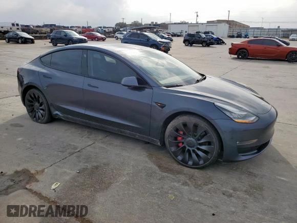 2021 Tesla Model 3 Performance with VIN 5YJ3E1EC5MF850673, listed as a Copart auction lot 47560665 with 96,950 mi miles and Salvage Title. Bid and sale history available at DreamBid. Image 4.