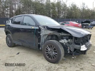 2020 Mazda CX-5 Touring with VIN JM3KFACM1L0767976, listed as a Copart auction lot 46299715 with 148,137 mi miles and Salvage Title. Bid and sale history available at carsss.com. Image 4.