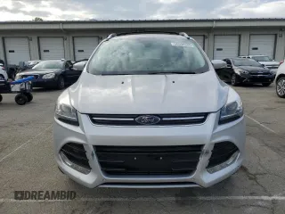 2015 Ford Escape Titanium с VIN 1FMCU9J99FUC33052, выставлен на аукционе Copart как лот 56508365 с пробегом Не указан миль и На запчасти • Non repairable. История ставок и продаж доступна на DreamBid. Изображение 5.