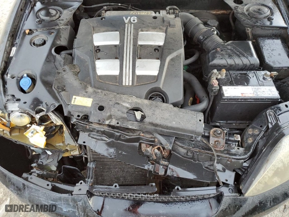 2006 Hyundai Tiburon GT with VIN KMHHN65FX6U224913, listed as a Copart auction lot 80695184 with 146,676 mi miles and Salvage Title. Bid and sale history available at carsss.com. Image 11.