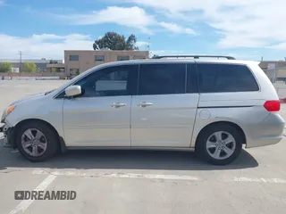 2009 Honda Odyssey Touring с VIN 5FNRL38969B013708, выставлен на аукционе IAAI как лот 42002538 с пробегом 198 220 миль миль и . История ставок и продаж доступна на DreamBid. Изображение 14.