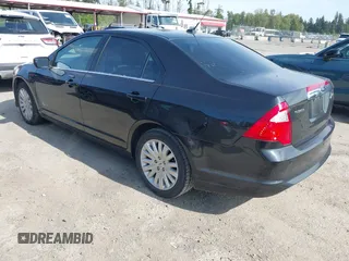 2012 Ford Fusion Hybrid z VIN 3FADP0L31CR380821, wystawiony jako IAAI lot #42332256 z przebiegiem 59 431 mil mil oraz . Historia ofert i sprzedaży dostępna na DreamBid. Obrazek 3.