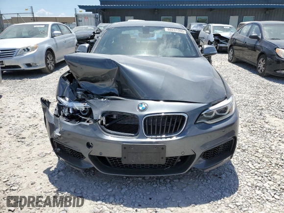2015 BMW 2 Series M235i with VIN WBA1J7C55FV253647, listed as a Copart auction lot 60231395 with 57,639 mi miles and Salvage title. Bid and sale history available at DreamBid. Image 5.