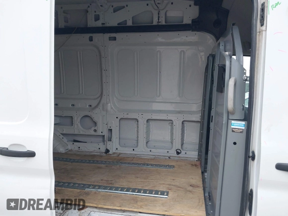 2017 Ford Transit Cargo with VIN 1FTBW3XG7HKA27501, listed as a IAAI auction lot 41420053 with 394,696 mi miles. Bid and sale history available at carsss.com. Image 8.