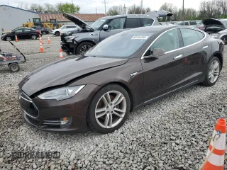 2014 Tesla Model S 60 with VIN 5YJSA1H19EFP51003, listed as a Copart auction lot 52164335 with 105,926 mi miles and Salvage Title. Bid and sale history available at DreamBid. Image 1.