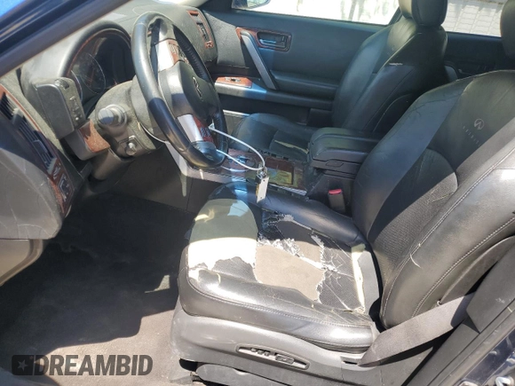 2005 Infiniti FX z VIN JNRAS08W95X216368, wystawiony jako Copart lot #54745065 z przebiegiem 232 897 mil mil oraz Szkoda całkowita • Salvage title. Historia ofert i sprzedaży dostępna na DreamBid. Obrazek 7.