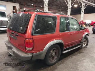 1999 Ford Explorer z VIN 1FMZU24E2XUA40849, wystawiony jako IAAI lot #41250506 z przebiegiem 174 706 mil mil oraz . Historia ofert i sprzedaży dostępna na DreamBid. Obrazek 4.