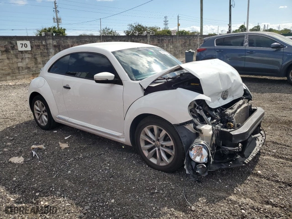 2017 Volkswagen Beetle 1.8T Fleet with VIN 3VWF17AT1HM617468, listed as a Copart auction lot 82233824 with 72,800 mi miles and Salvage Title. Bid and sale history available at carsss.com. Image 4.