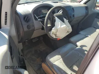 2006 Ford F-150 XL with VIN 1FTRF12W06NA22654, listed as a Copart auction lot 57064735 with 228,697 mi miles and Salvage title. Bid and sale history available at DreamBid. Image 8.