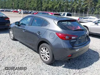 2015 Mazda 3 i Touring z VIN JM1BM1L73F1238360, wystawiony jako IAAI lot #42455285 z przebiegiem 124 319 mil mil oraz . Historia ofert i sprzedaży dostępna na DreamBid. Obrazek 3.