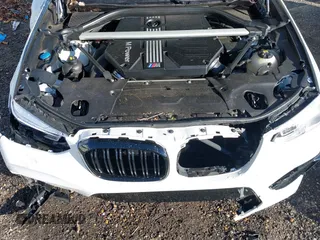 2020 BMW X3 M with VIN 5YMTS0C03L9B77591, listed as a IAAI auction lot 41015612 with 1 mi miles. Bid and sale history available at carsss.com. Image 10.