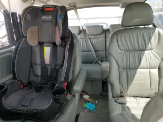 2010 Honda Odyssey EX-L с VIN 5FNRL3H79AB073307, выставлен на аукционе Copart как лот 55642225 с пробегом Не указан миль и Списание • Salvage title. История ставок и продаж доступна на DreamBid. Изображение 10.