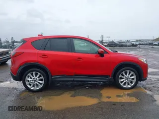 2015 Mazda CX-5 Grand Touring with VIN JM3KE4DY6F0501072, listed as a IAAI auction lot 41534176 with 90,160 mi miles. Bid and sale history available at carsss.com. Image 13.