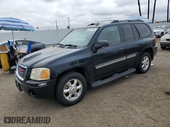 2004 GMC Envoy SLE with VIN 1GKDT13S442155788, listed as a Copart auction lot 50270135 with 164,271 mi miles and Salvage Title. Bid and sale history available at carsss.com. Image 1.