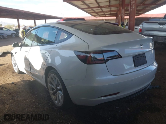 2021 Tesla Model 3 Long Range with VIN 5YJ3E1EBXMF868965, listed as a IAAI auction lot 41548119 with 43,087 mi miles and . Bid and sale history available at DreamBid. Image 3.